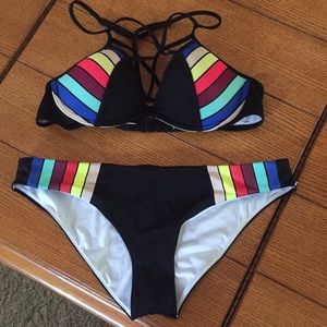 Rainbow and black bathing suit top and bottom